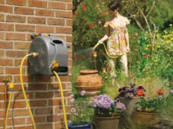 Hozelock Compact Reel 25m - Alton Garden Centre -Garden Strimmers Shop 2415 lifestyle RT yellow hose