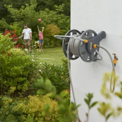 Hozelock Assembled 2-in-1 Hose Reel (60m) - Alton Garden Centre -Garden Strimmers Shop 2n1 Reel on Wall 3